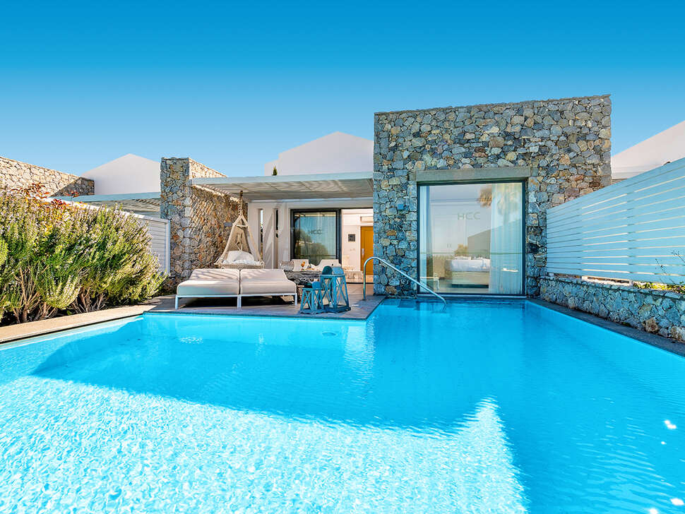 Zwembad van Diamond Deluxe Hotel Lambi, Griekenland foto 2