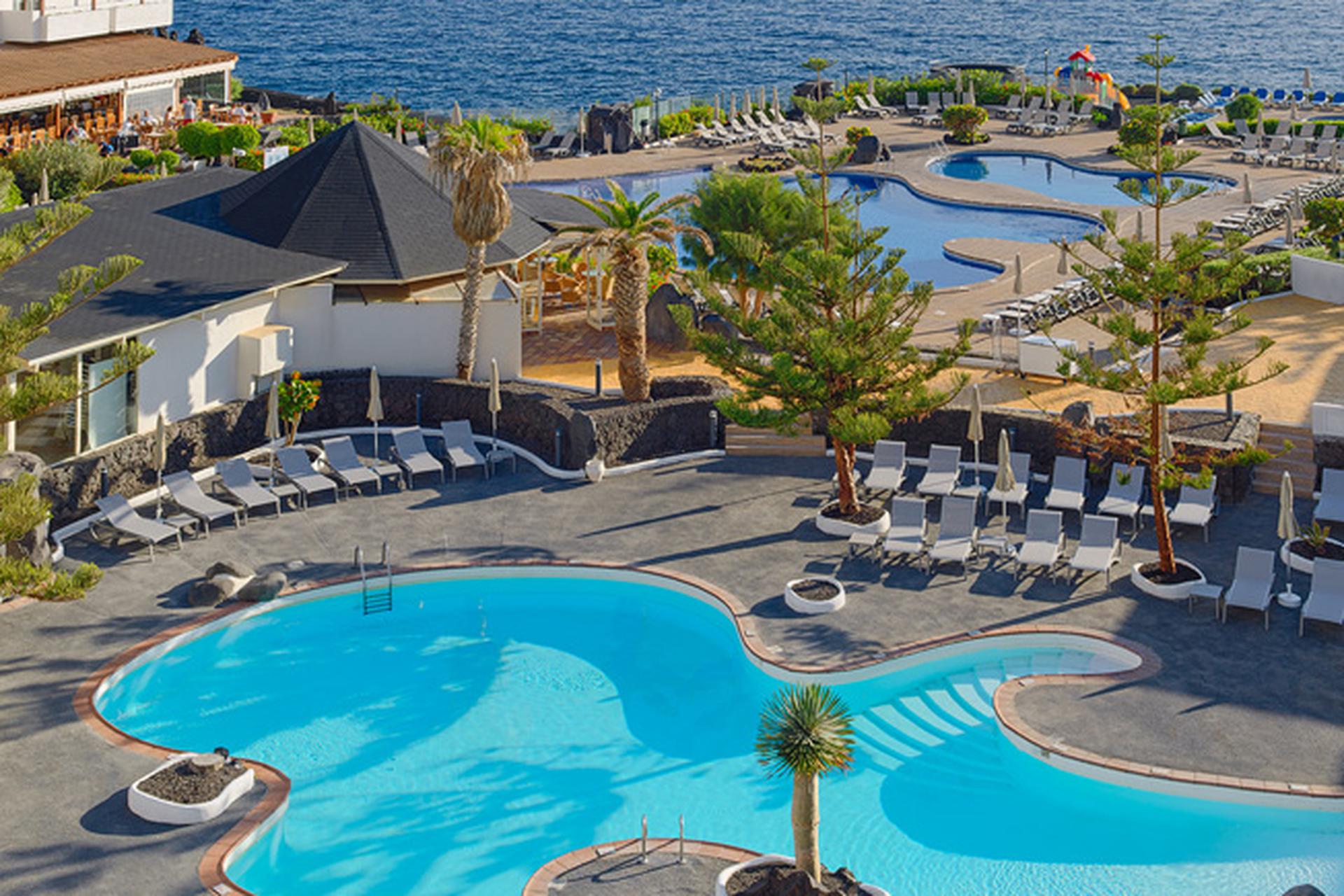 Zwembad van H10 Taburiente Playa Hotel Los Cancajos, Spanje foto 1