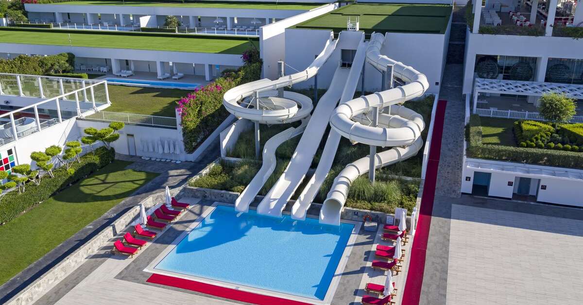 Zwembad met glijbanen van Adam & Eve Hotel in Belek, Turkije foto 1