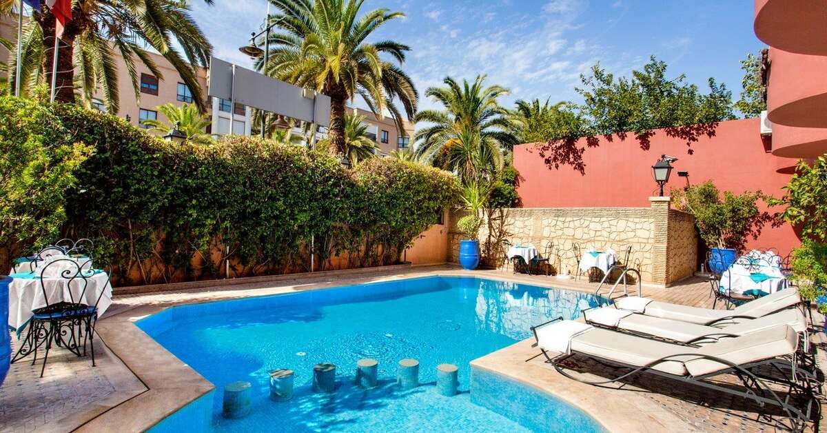 Zwembad van Akabar Hotel Marrakech, Marokko foto 1
