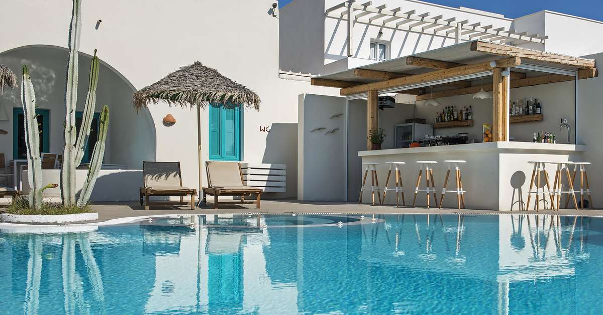 Zwembad van Appartementen Nissia Hotel in Kamari, Griekenland foto 3