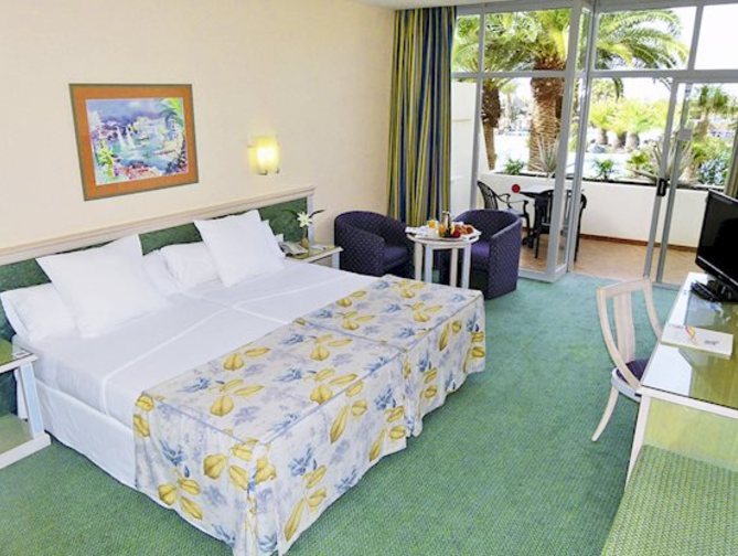 Slaapkamer in het Beatriz Costa & Spa Hotel in Costa Teguise, Spanje foto 6