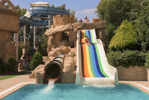 Zwembad met glijbanen van Delphin Deluxe Resort Alanya, Turkije foto 3
