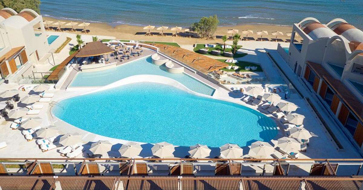 Zwembad van Domes Noruz Chania Autograph Collection Hotel Aghii Apostoloi, Griekenland foto 2