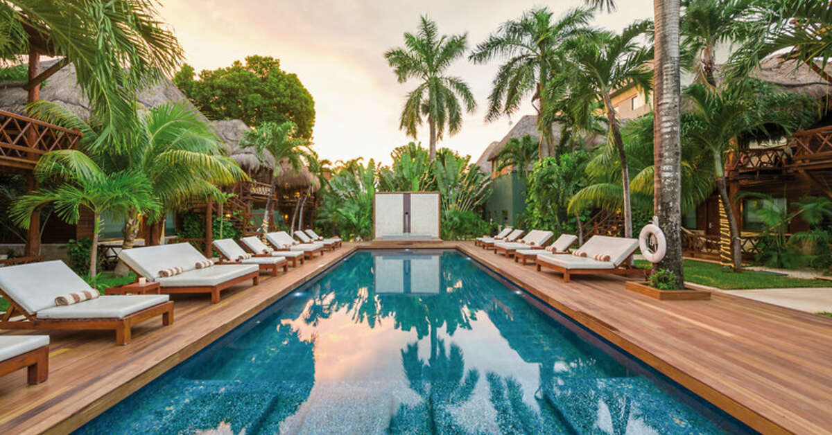 Zwembadzijde bij Boutique Magic Blue Hotel in Playa del Carmen, Mexico foto 1