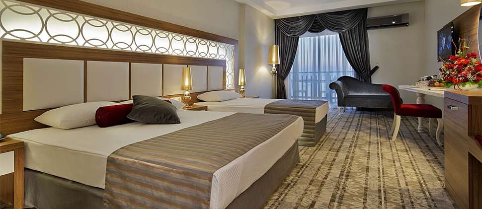 Hotelkamer in Hotel Justiniano Deluxe Resort in Okurcalar, Turkije foto 1