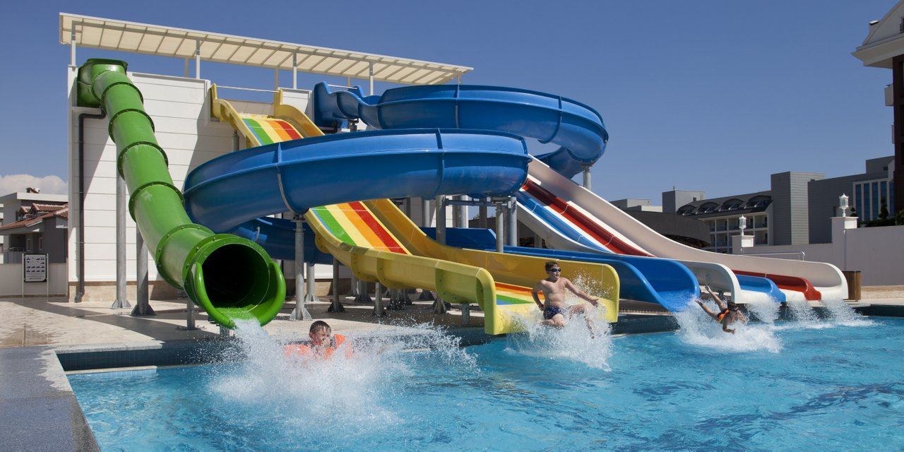 Zwembad met glijbanen van Oz Premium Hotel in Side, Turkije foto 2