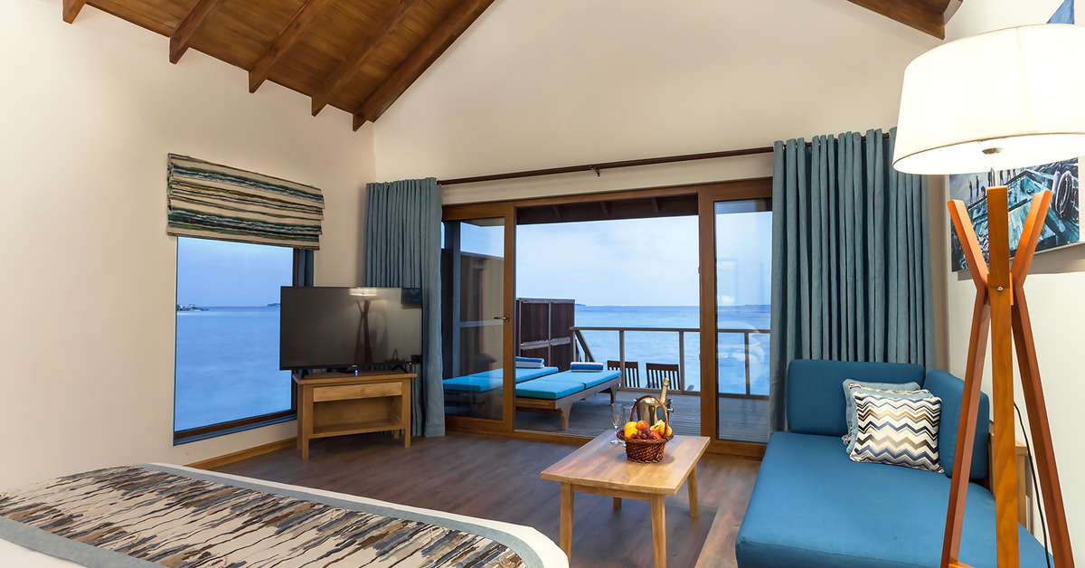 Hotelkamer in Reethi Faru Resort Kudafushi, Malediven foto 3