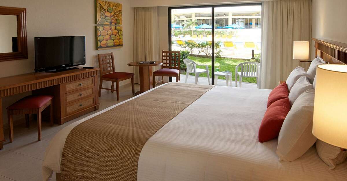 Hotelkamer in The Reef Coco Beach Hotel in Playa Del Carmen, Mexico foto 3