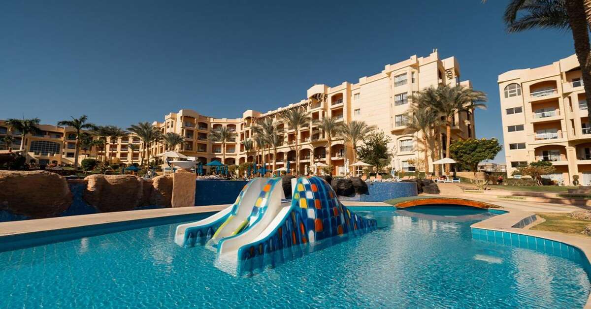 Zwembad met glijbanen van Tropitel Sahl Hasheesh Hotel in Makadi Bay, Egypte foto 
